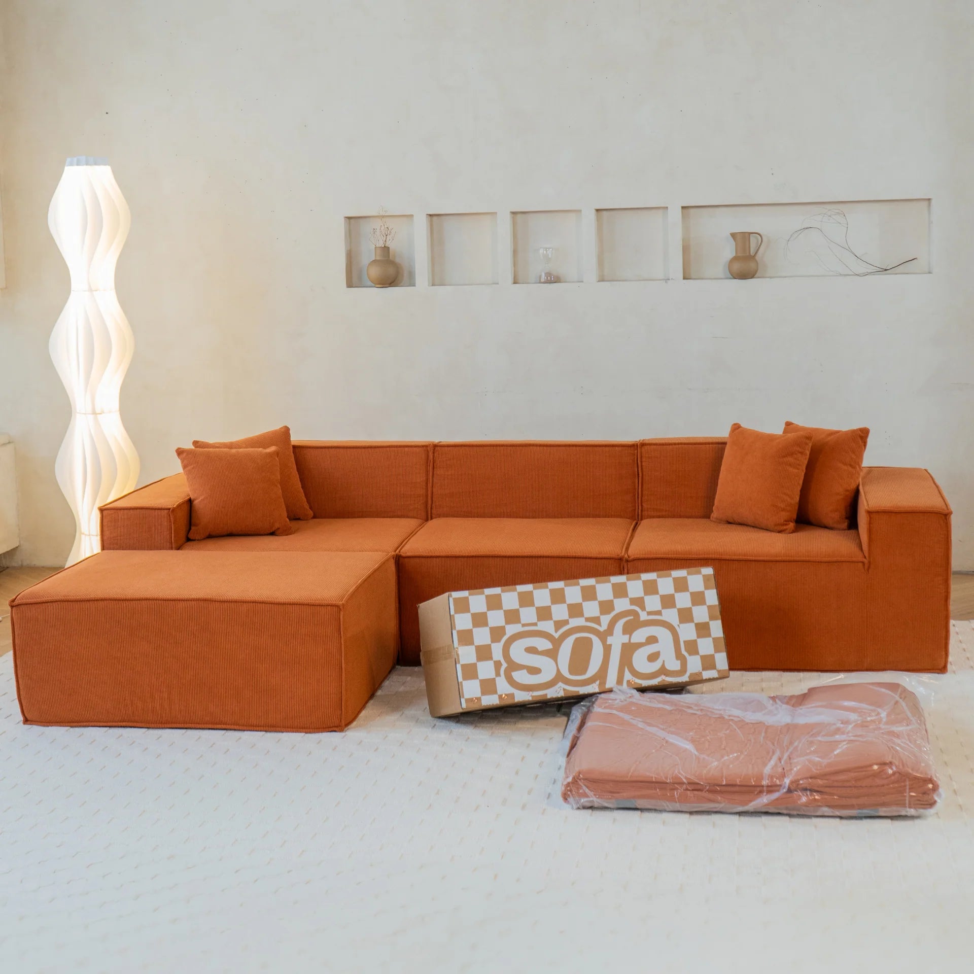 <tc>Sofa en la Caja</tc> Pelion 3 plazas + 1 chaise en Boucle - Naranja